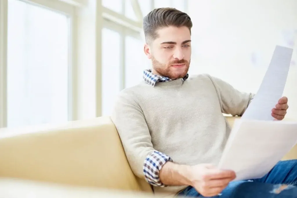 How to Choose the Right Shopfitter for Your Project 2 going over documents